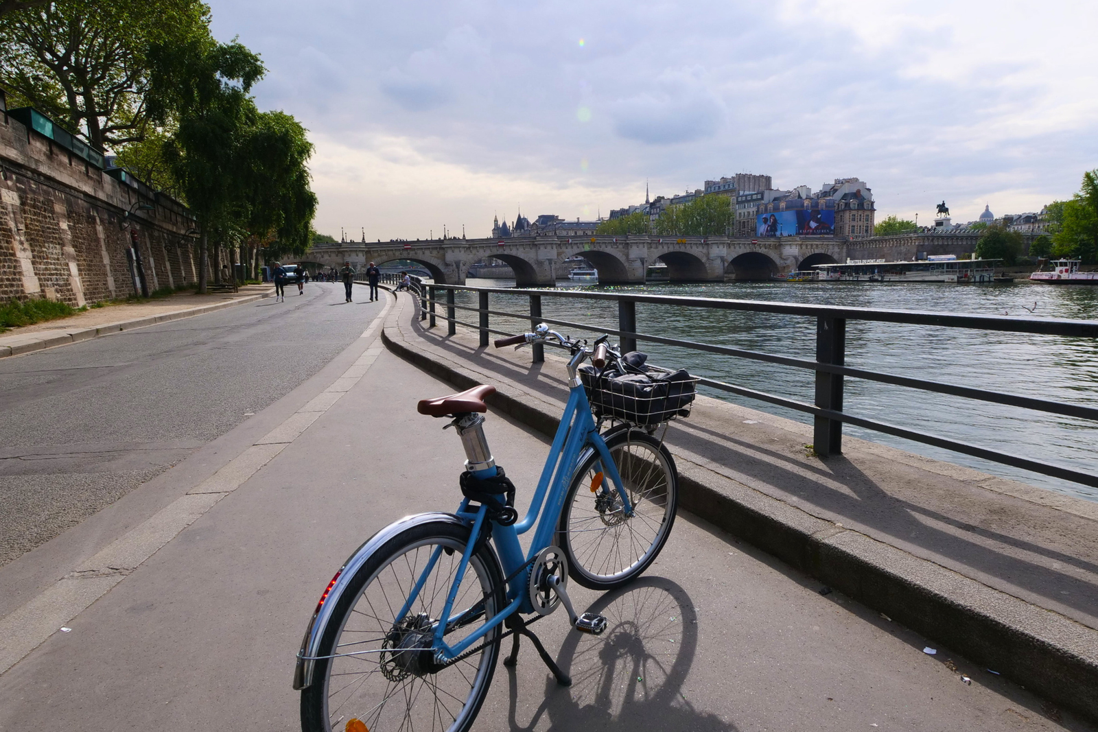 A TourYours classic bike beside the Seine and Pont Neuf